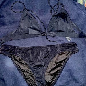 2 piece swim suite top and bottom are both Victoria secret Black